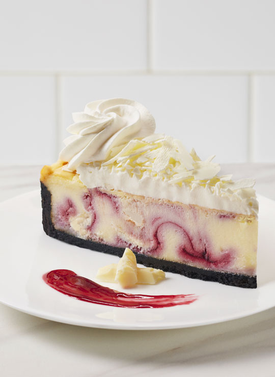 A slice of White Chocolate Raspberry Cheesecake